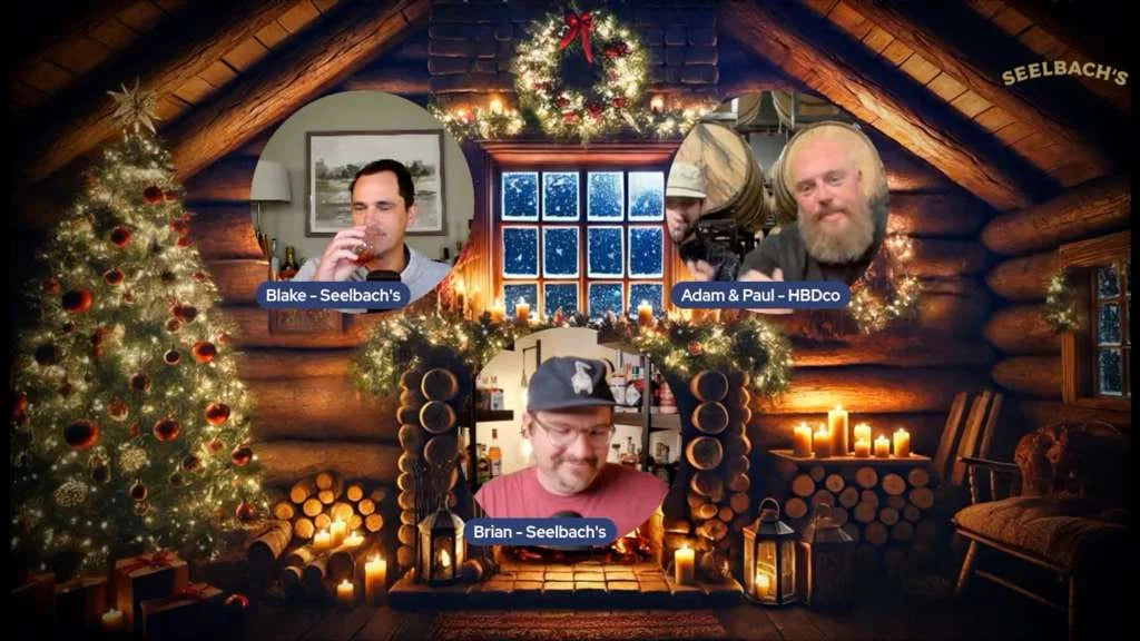 Advent tasting video call with Blake and Brian from Seelbach's and Adam and Paul from HBDco, set in a holiday log cabin